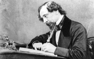 dickens-at-desk